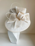 MADOX IVORY SHAPED BRIM FORMAL HAT WITH BOW AND COIL DETAILING