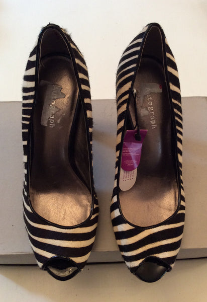 Black and white pumps 3 inch heel online