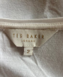 TED BAKER TEILA WHITE FLORAL PRINT FRONT CAP SLEEVE TOP SIZE 2 UK 10/12