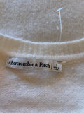 ABERCROMBIE & FITCH IVORY SHORT SLEEVE JUMPER SIZE S