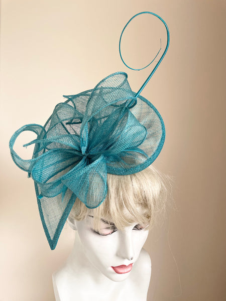 TURQOUISE BOW TRIM & COIL STICK TRIM FASCINATOR ON HEADBAND