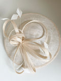 MADDOX NATURAL STRAW  HATINATOR WITH IVORY FEATHERS AND BOW TRIM ON HEADBAND