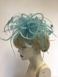 TAILOR MADE TURQUOISE FLOATING FEATHERS & MESH COILS FASCINATOR
