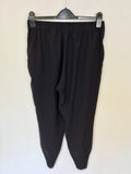 COS BLACK PLEATED CUFF ANKLE LENGTH TAPERED TROUSERS SIZE 34 UK 6 FIT SIZE 8/10