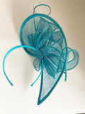TURQOUISE BOW TRIM & COIL STICK TRIM FASCINATOR ON HEADBAND