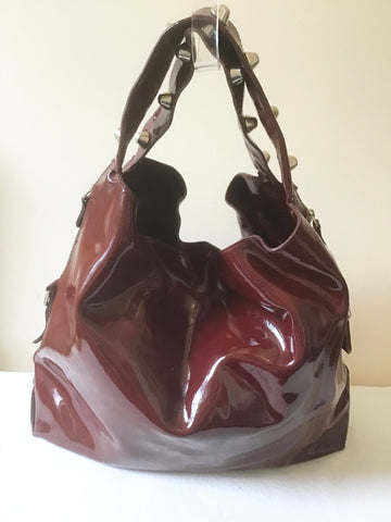 RUSSELL & BROMLEY BURGUNDY PATENT LEATHER SILVER STUD TRIM SHOULDER BAG