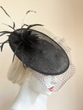 BLACK HATINATOR WITH FEATHERS AND NET TRIM ON HEADBAND