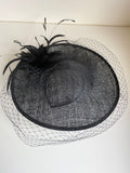 BLACK HATINATOR WITH FEATHERS AND NET TRIM ON HEADBAND