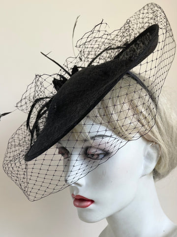 BLACK HATINATOR WITH FEATHERS AND NET TRIM ON HEADBAND