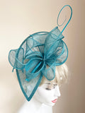 TURQOUISE BOW TRIM & COIL STICK TRIM FASCINATOR ON HEADBAND