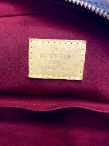 LOUIS VUITTON MONOGRAMED EXCENTRI CITE HANDBAG
